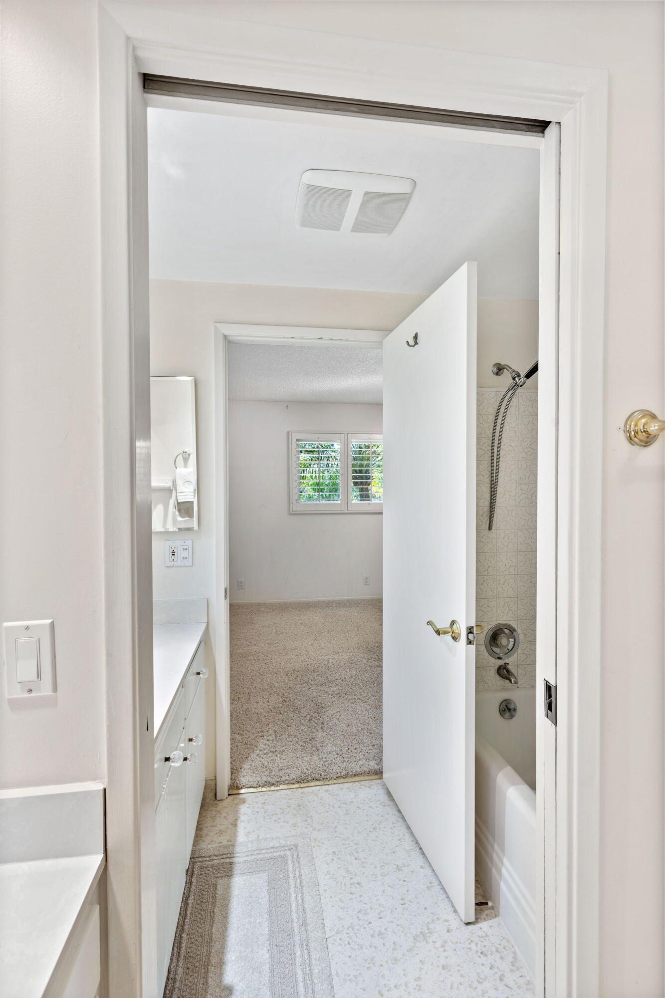 5822 Encina Road, Unit 2 Santa Barbara, CA 93117 - Photo 16 of 42 a bathroom with a shower and a glass door