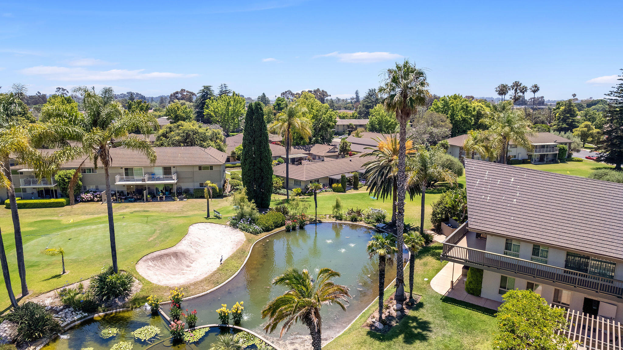 5822 Encina Road, Unit 2 Santa Barbara, CA 93117 - Photo 19 of 42 a view of a swimming pool with a patio