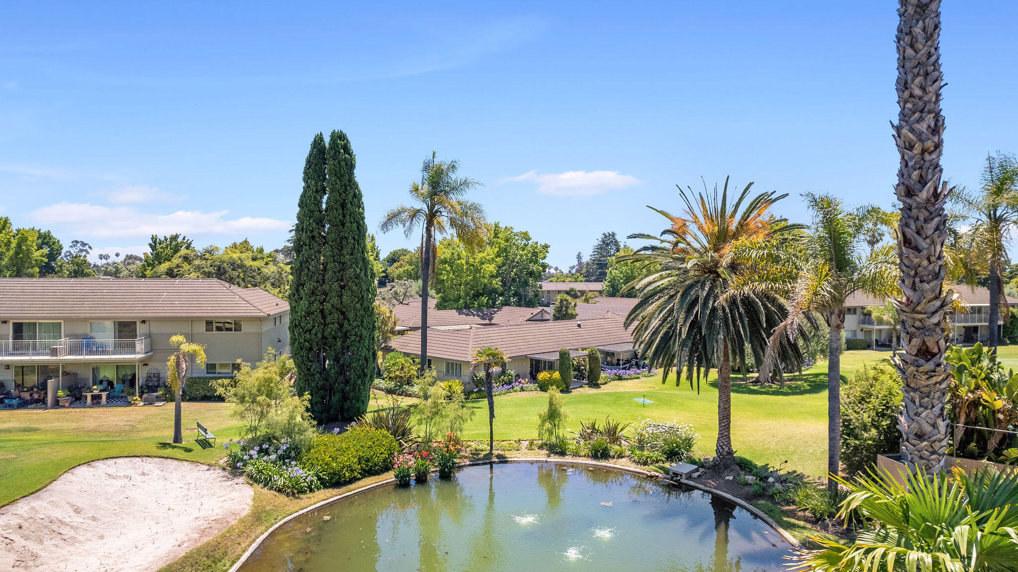 5822 Encina Road, Unit 2 Santa Barbara, CA 93117 - Photo 20 of 42 a view of swimming pool with a garden and outdoor seating