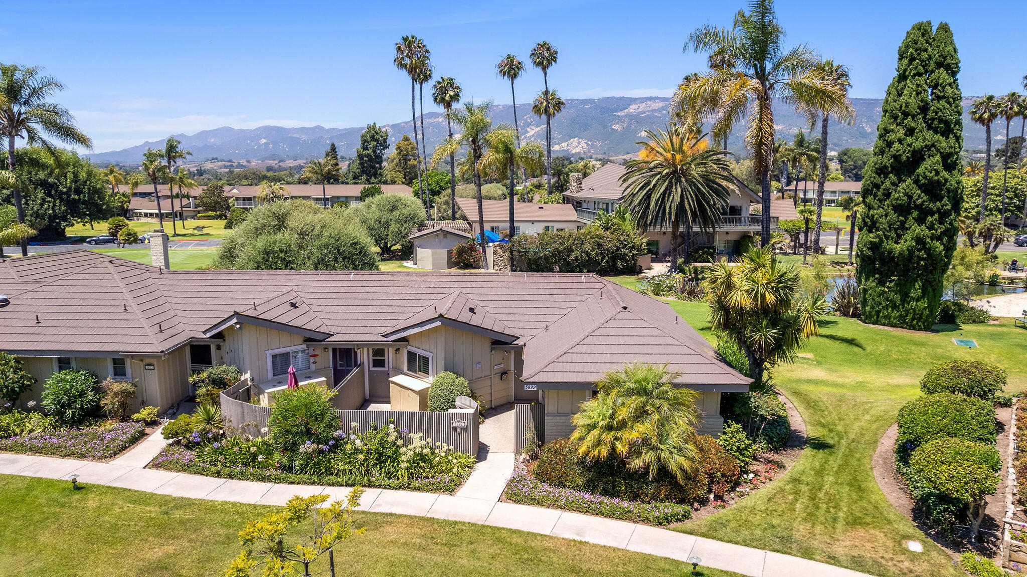 5822 Encina Road, Unit 2 Santa Barbara, CA 93117 - Photo 21 of 42 a view of a house with a yard and potted plants