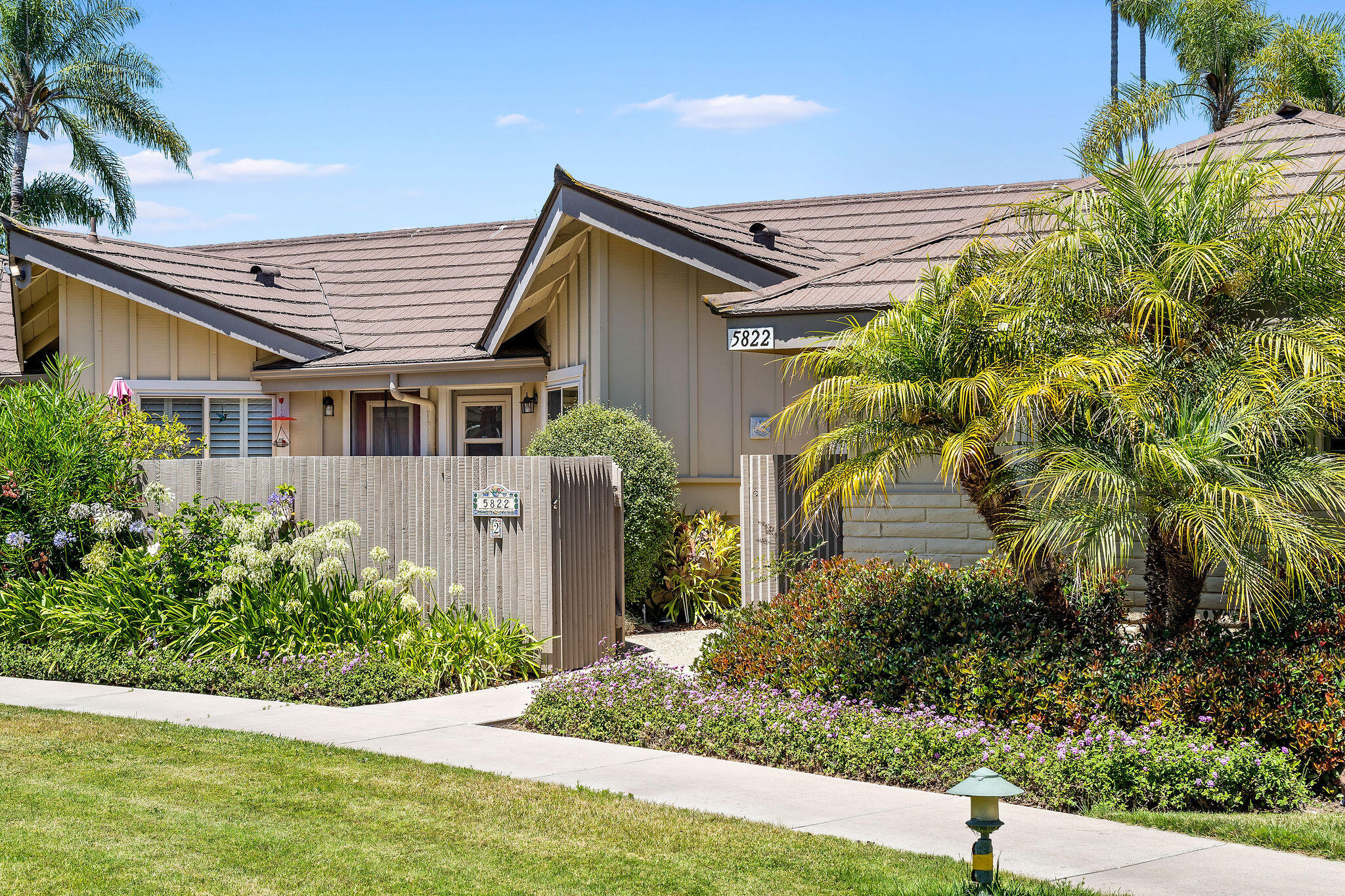 5822 Encina Road, Unit 2 Santa Barbara, CA 93117 - Photo 26 of 42 a front view of a house with garden