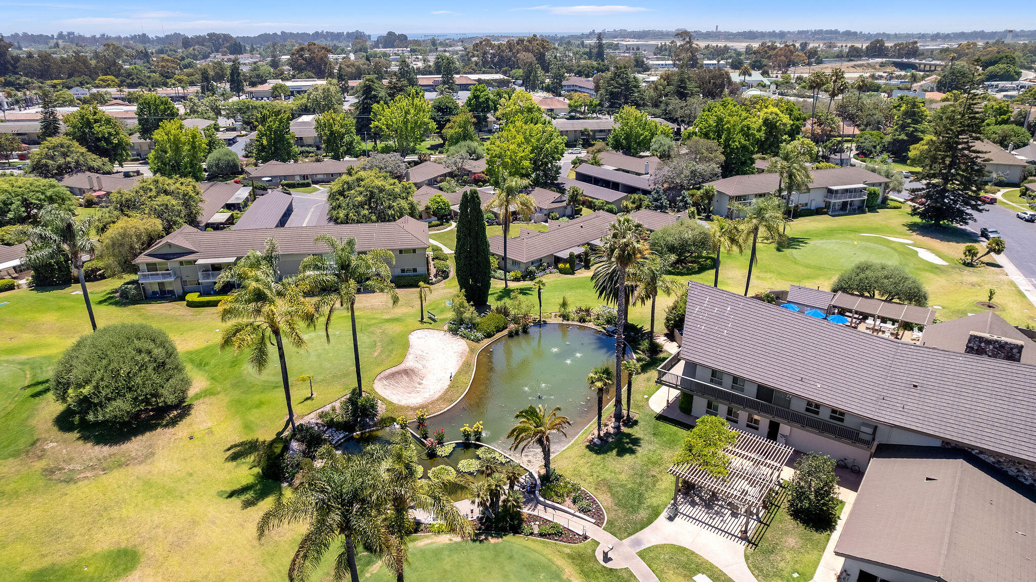 5822 Encina Road, Unit 2 Santa Barbara, CA 93117 - Photo 33 of 42 an aerial view of a swimming pool patio and mountain view