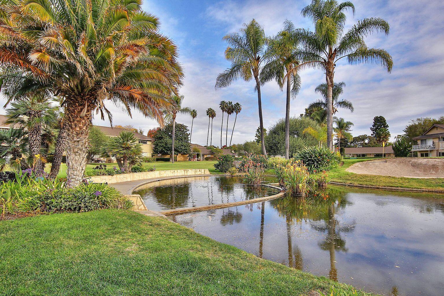5822 Encina Road, Unit 2 Santa Barbara, CA 93117 - Photo 40 of 42 a view of swimming pool with a table and chairs