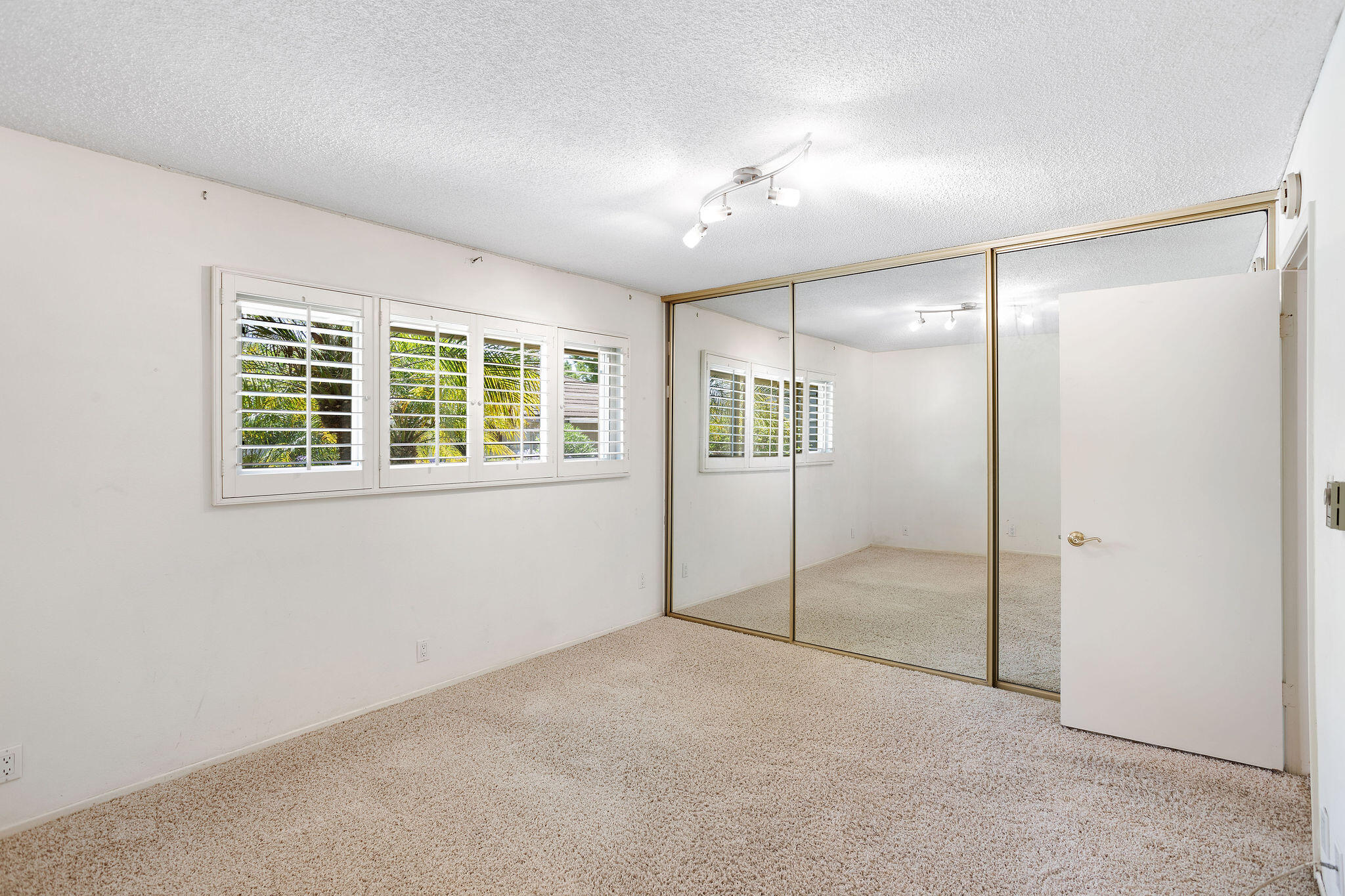 5822 Encina Road, Unit 2 Santa Barbara, CA 93117 - Photo 9 of 42 a view of an empty room with a window