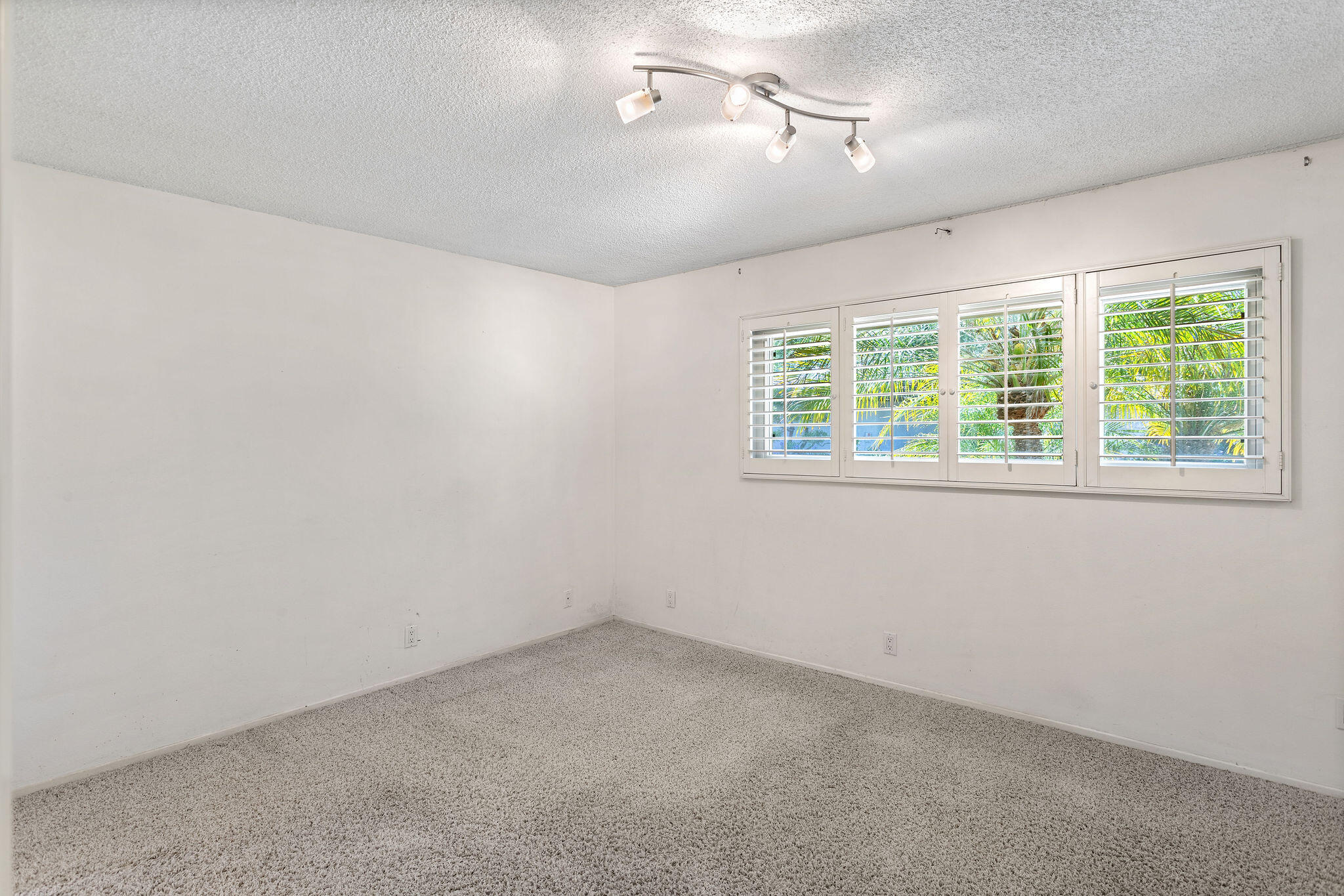 5822 Encina Road, Unit 2 Santa Barbara, CA 93117 - Photo 10 of 42 a view of an empty room with a window