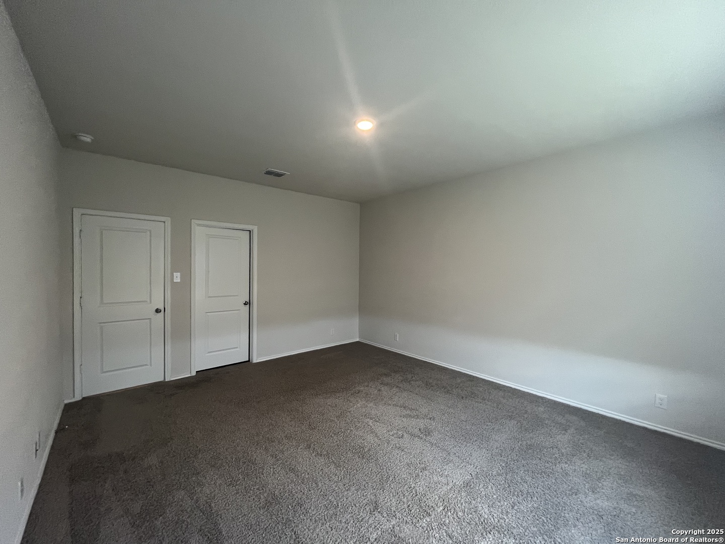 141 Middle Grn Loop Floresville, TX 78114 - Photo 10 of 29 a view of an empty room
