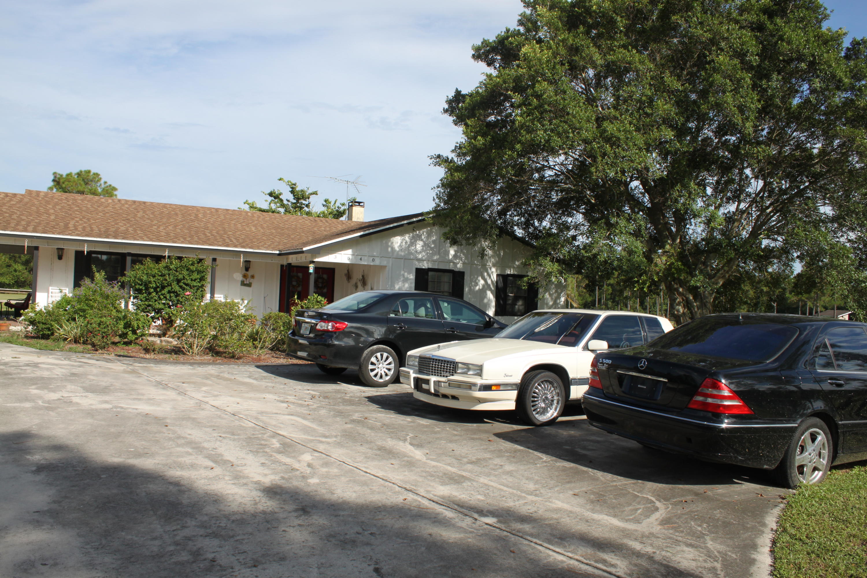 3840 Dellwood Road Loxahatchee, FL 33470 - Photo 23 of 60 a view of a cars parking space