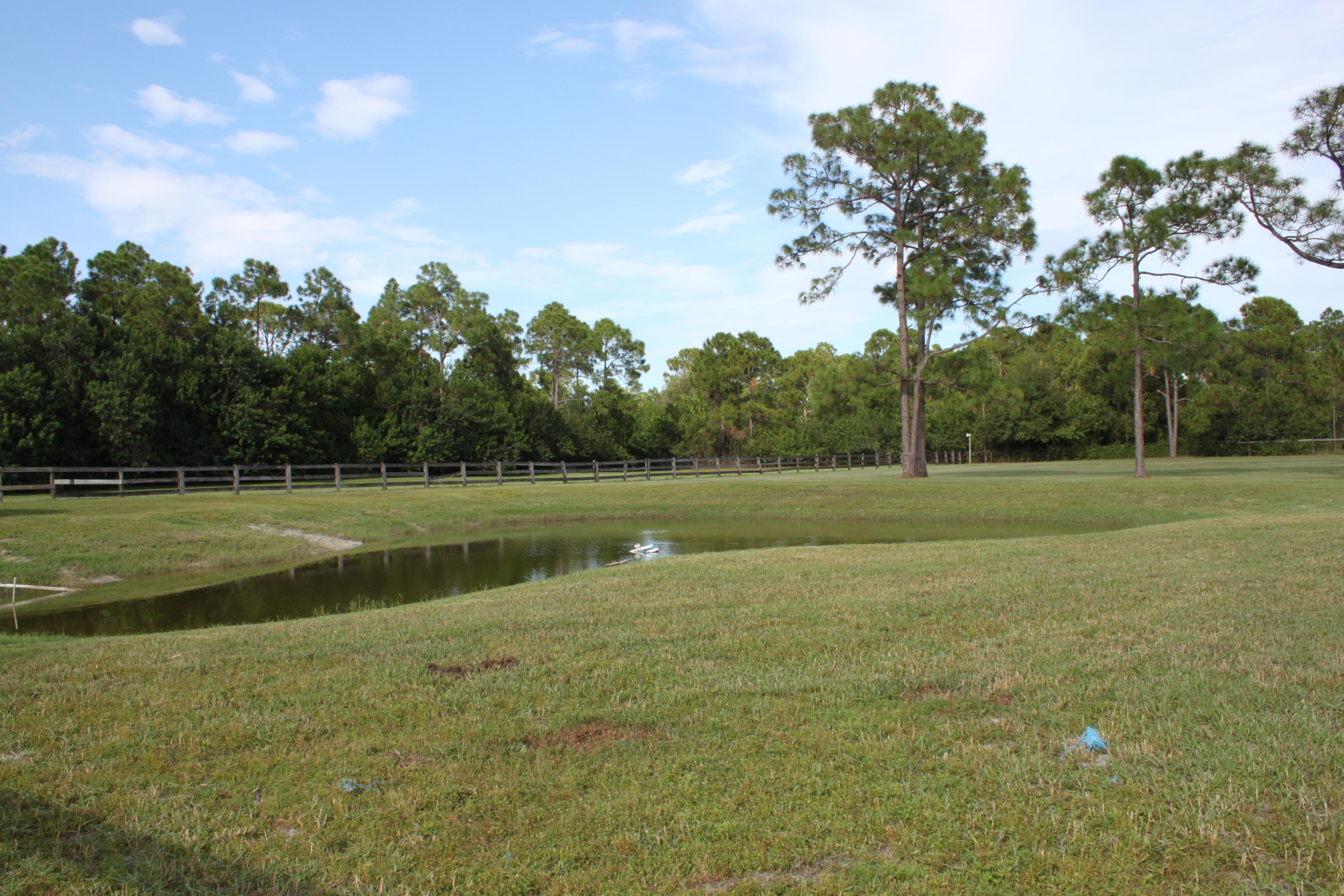 3840 Dellwood Road Loxahatchee, FL 33470 - Photo 39 of 60 a view of a golf course