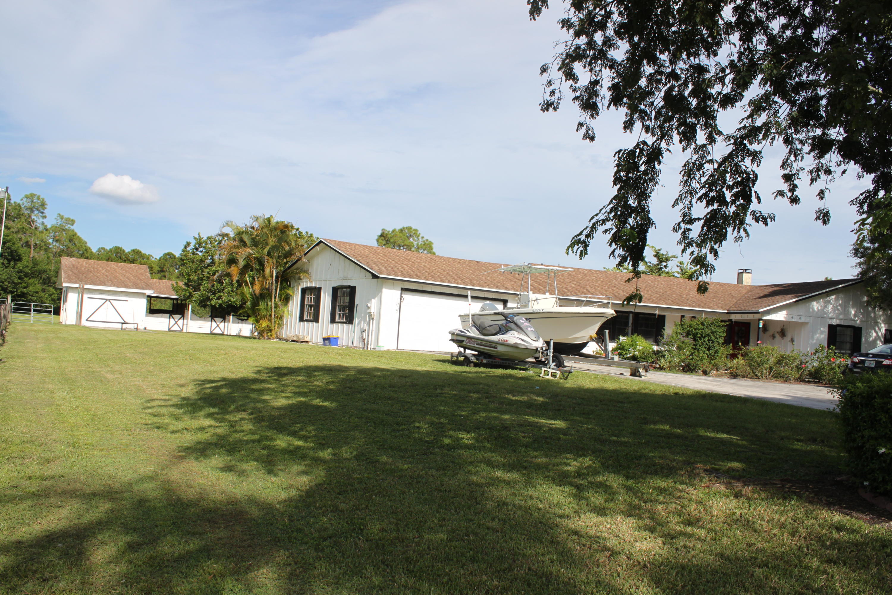 3840 Dellwood Road Loxahatchee, FL 33470 - Photo 4 of 60 a view of a house with a yard