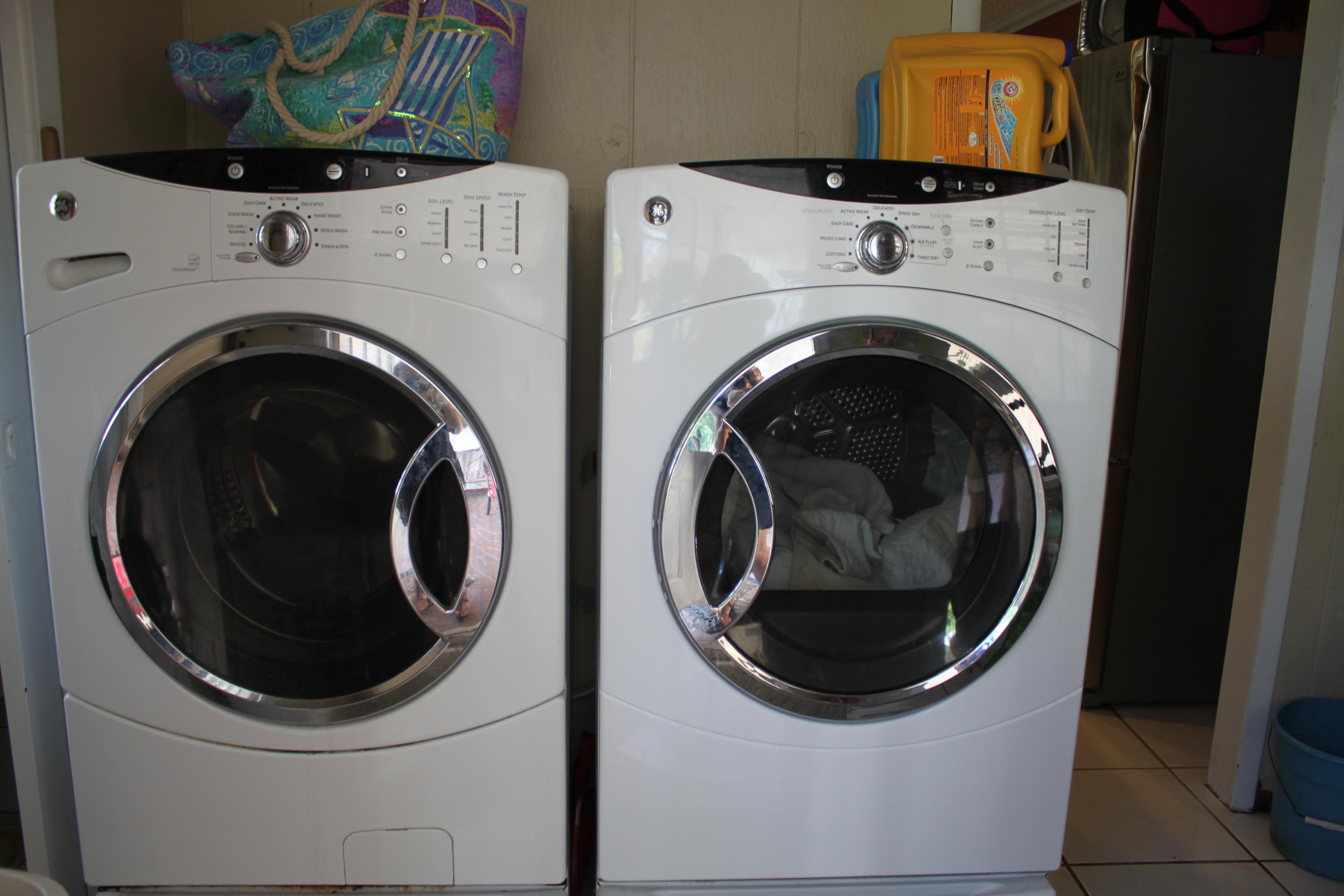 3840 Dellwood Road Loxahatchee, FL 33470 - Photo 52 of 60 a utility room with dryer and washer