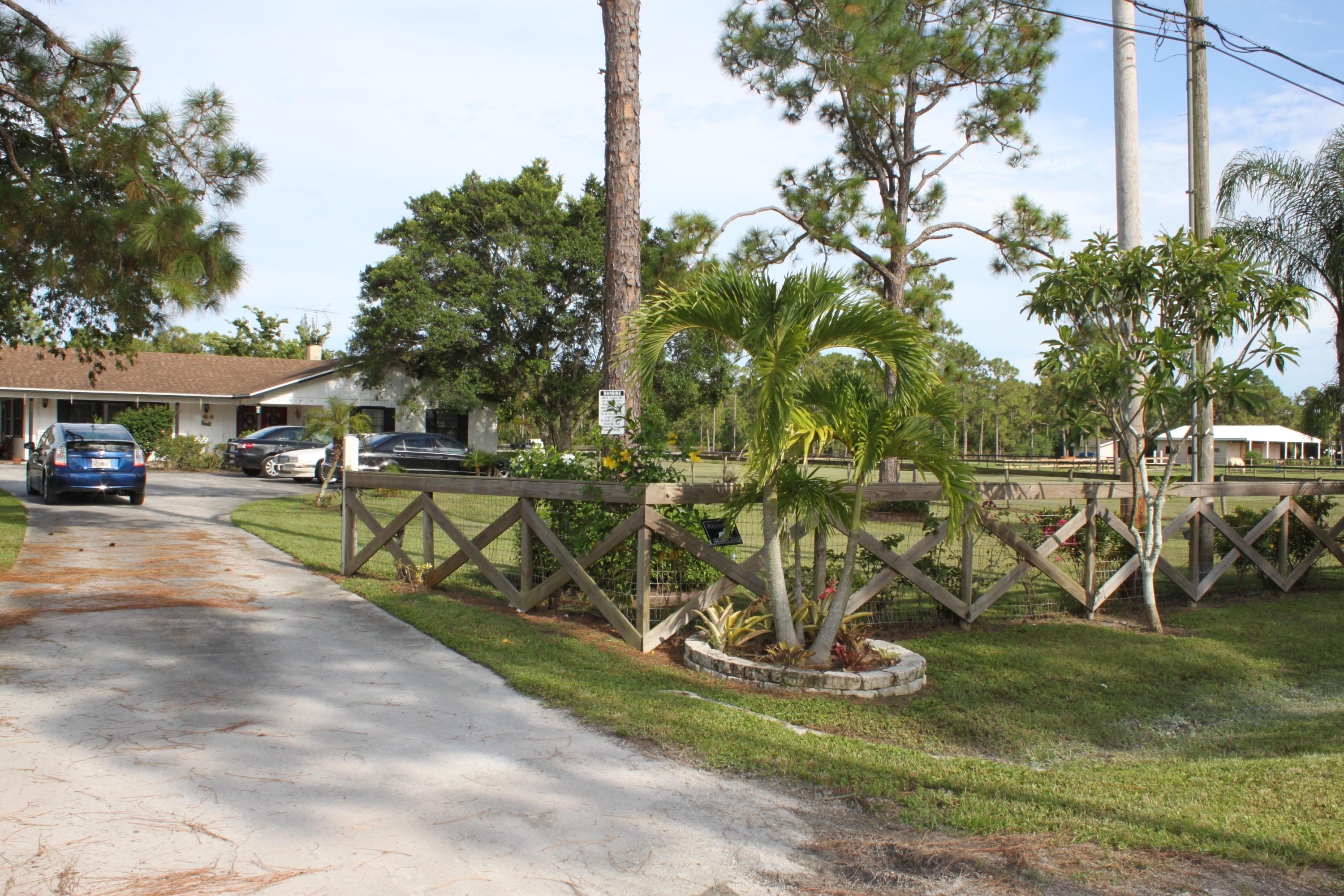 3840 Dellwood Road Loxahatchee, FL 33470 - Photo 7 of 60 a view of a park with large trees