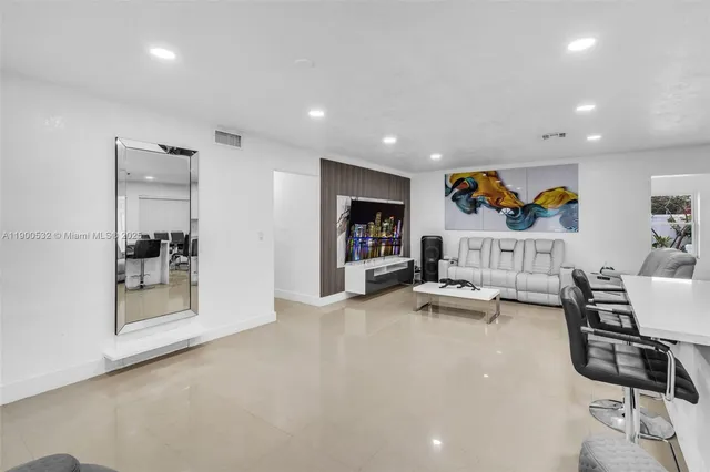 a view of a livingroom with furniture and a living room