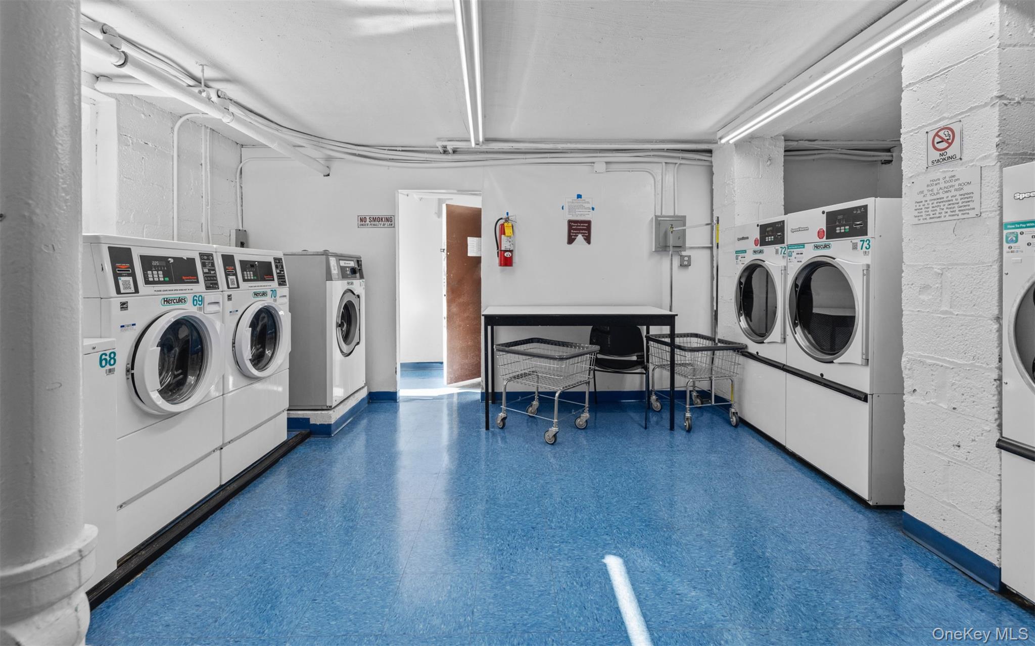 2 Edwards Street, Unit 3D Roslyn Heights, NY 11577 - Photo 19 of 20 a utility room with dryer and washer