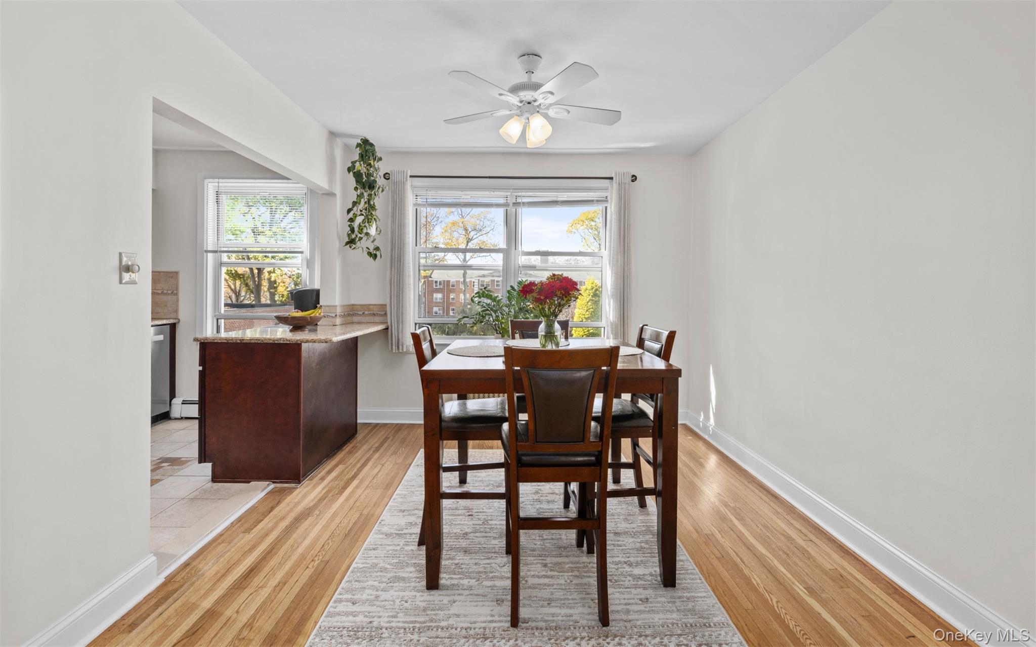 2 Edwards Street, Unit 3D Roslyn Heights, NY 11577 - Photo 8 of 20 a view of a dining room with furniture window and outside view