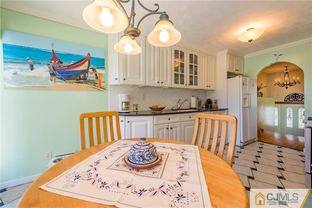 141 Devon Road Colonia, NJ 07067 - Photo 11 of 25 a kitchen with a appliances and cabinets