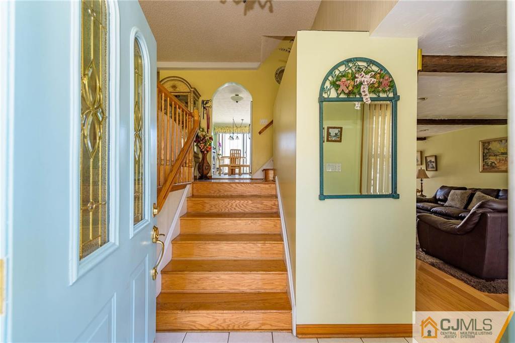 141 Devon Road Colonia, NJ 07067 - Photo 3 of 25 a view of an entryway with wooden floor