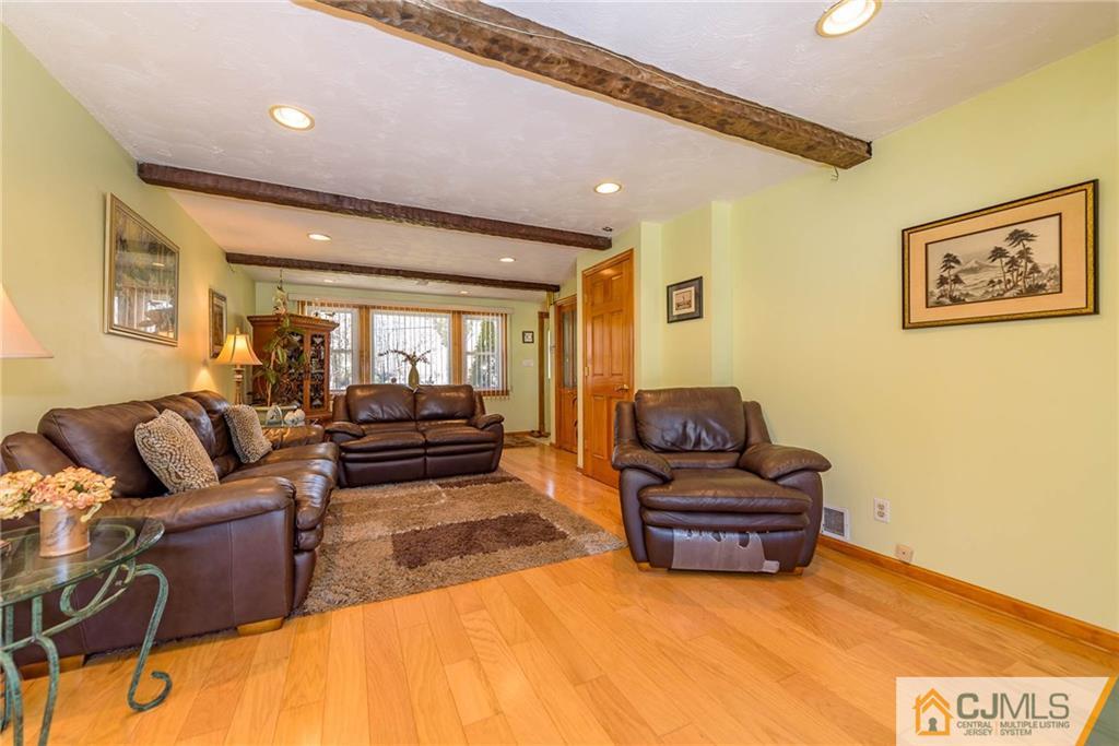 141 Devon Road Colonia, NJ 07067 - Photo 5 of 25 a living room with furniture