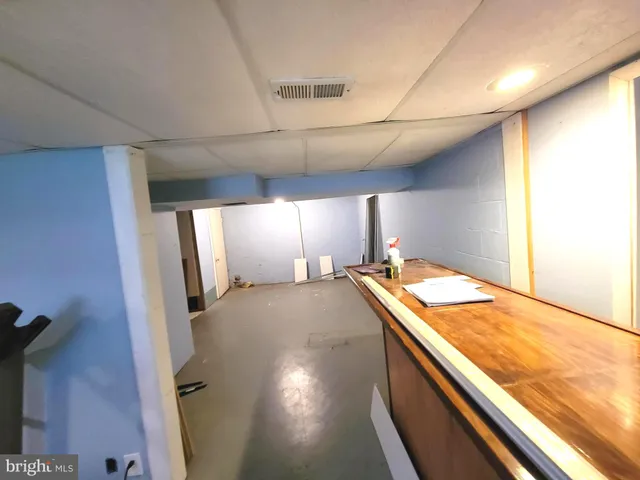 a view of a kitchen with a sink and dishwasher