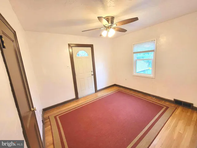 a view of a hallway with a chandelier