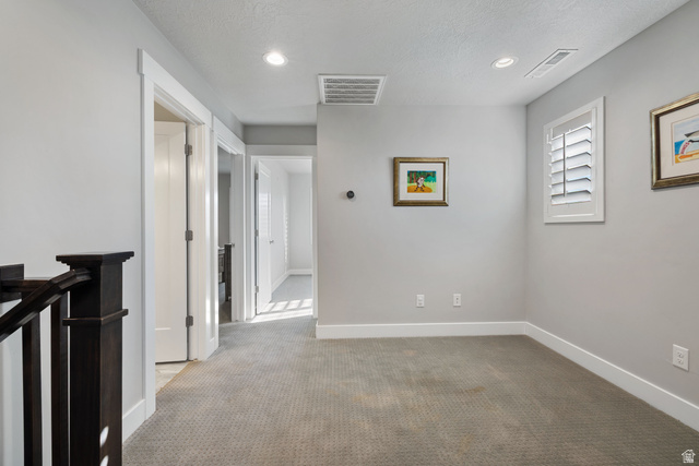 2745 Red Barn Road South Heber City, UT 84032 - Photo 20 of 51 Hall with carpet, recessed lighting, a textured ceiling, and an upstairs landing