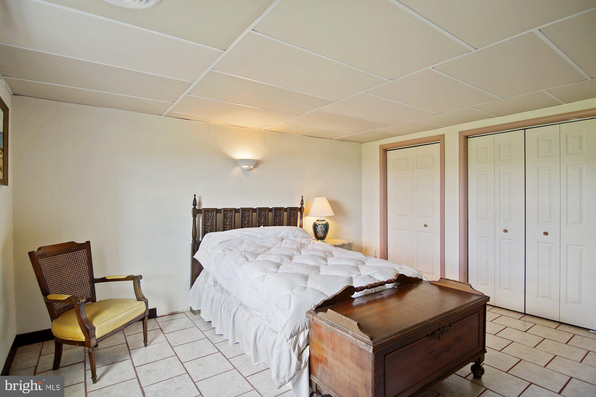 493 Hill Road Hegins, PA 17938 - Photo 27 of 46 Lower level bedroom with on suite bathroom.