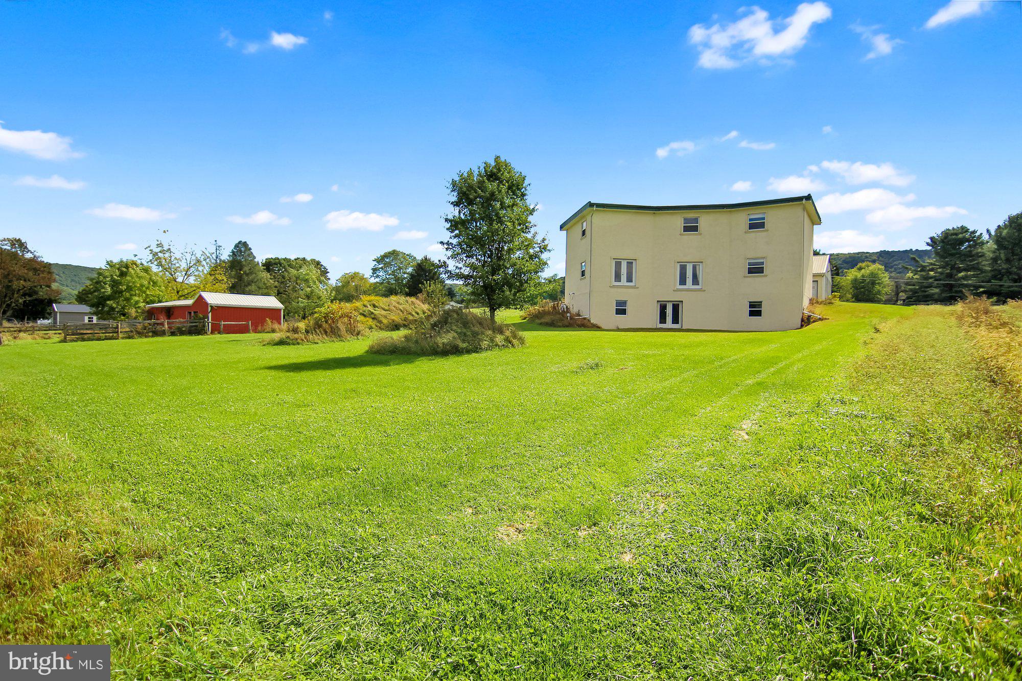 493 Hill Road Hegins, PA 17938 - Photo 44 of 46 Rear view of home from the backyard.