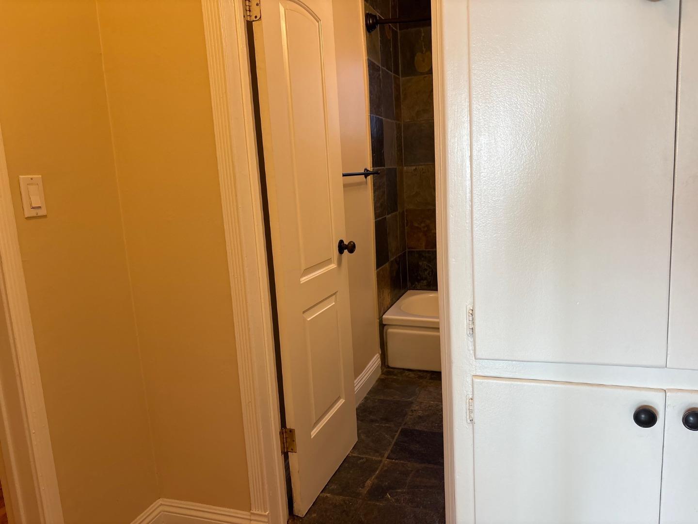 11719 Mayfield Avenue, Unit 1 Los Angeles, CA 90049 - Photo 23 of 28 a bathroom with a granite countertop sink