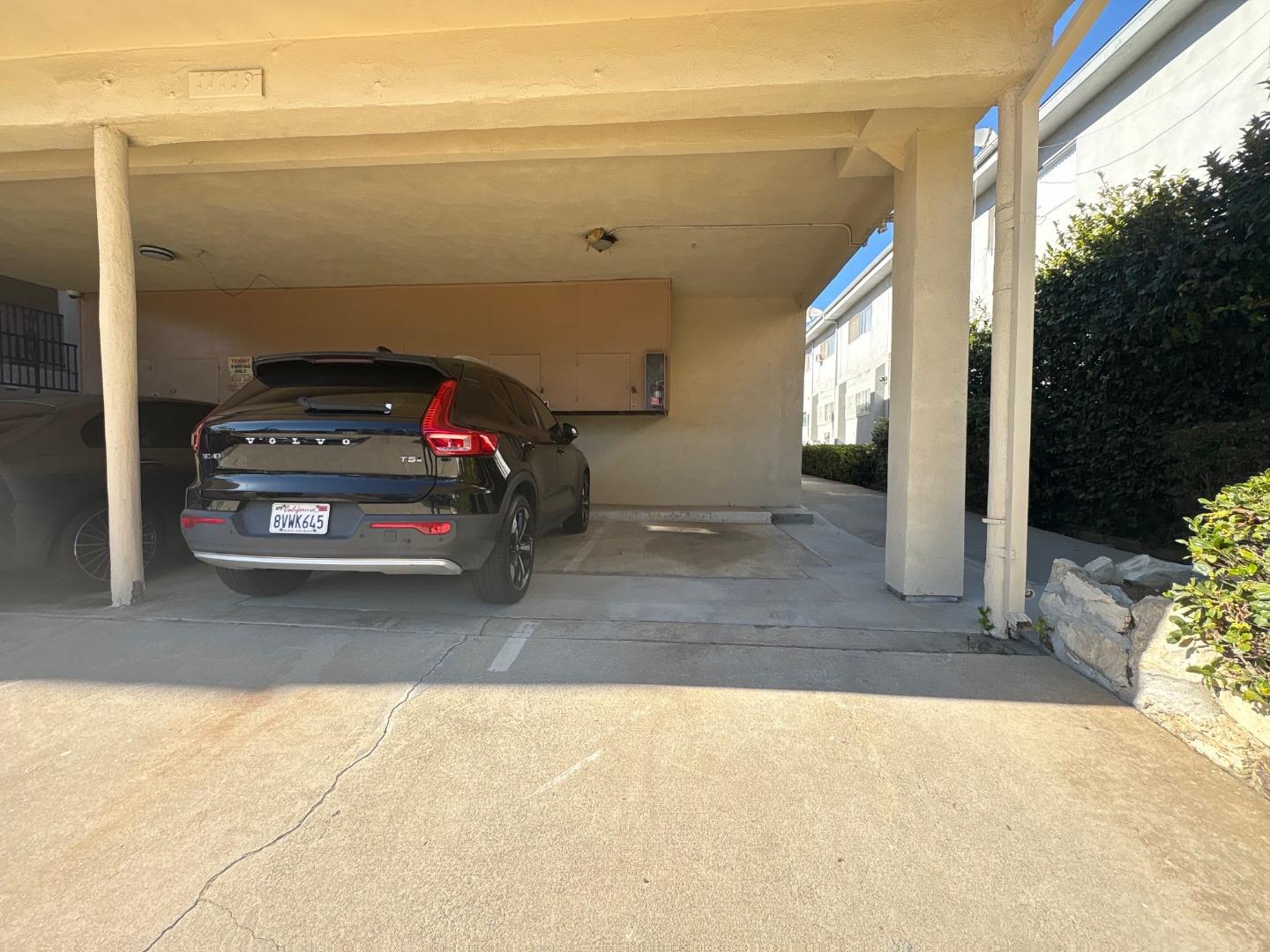 11719 Mayfield Avenue, Unit 1 Los Angeles, CA 90049 - Photo 4 of 28 a view of car garage