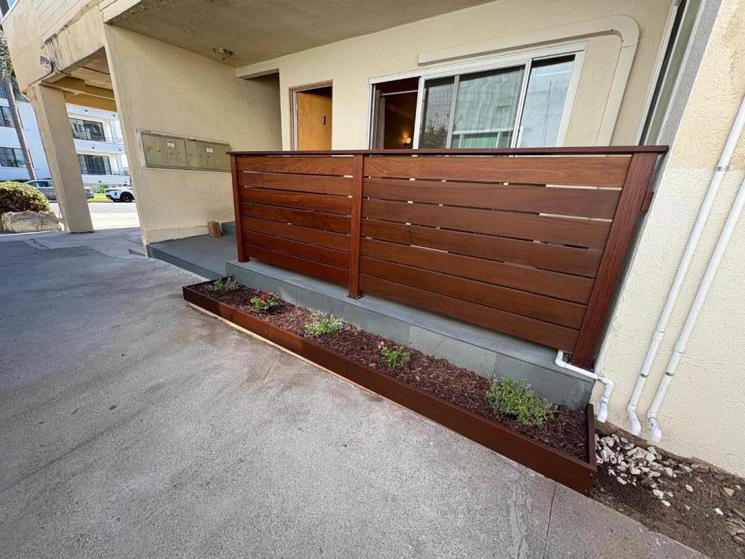 11719 Mayfield Avenue, Unit 1 Los Angeles, CA 90049 - Photo 6 of 28 a view of a car garage door