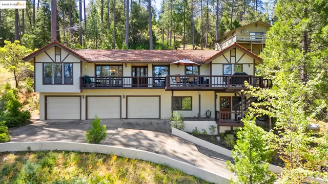 a front view of a house with swimming pool