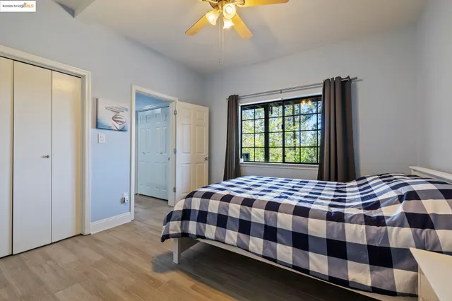 a view of a chairs and table in the balcony