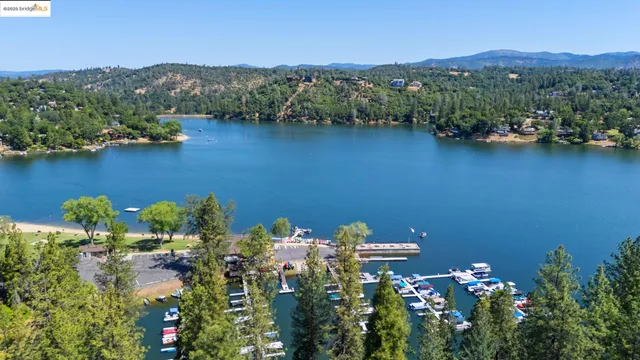 a view of a chairs and table in the patio
