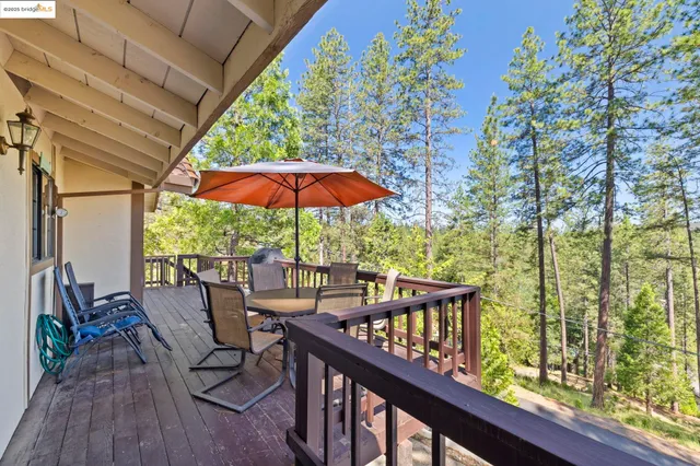 a view of kitchen with furniture and large window