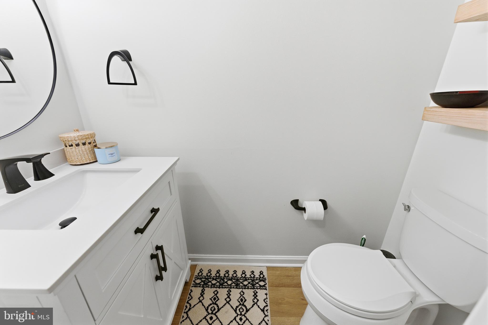 1 Weatherly Road Delran, NJ 08075 - Photo 27 of 32 a bathroom with a sink a toilet and a mirror