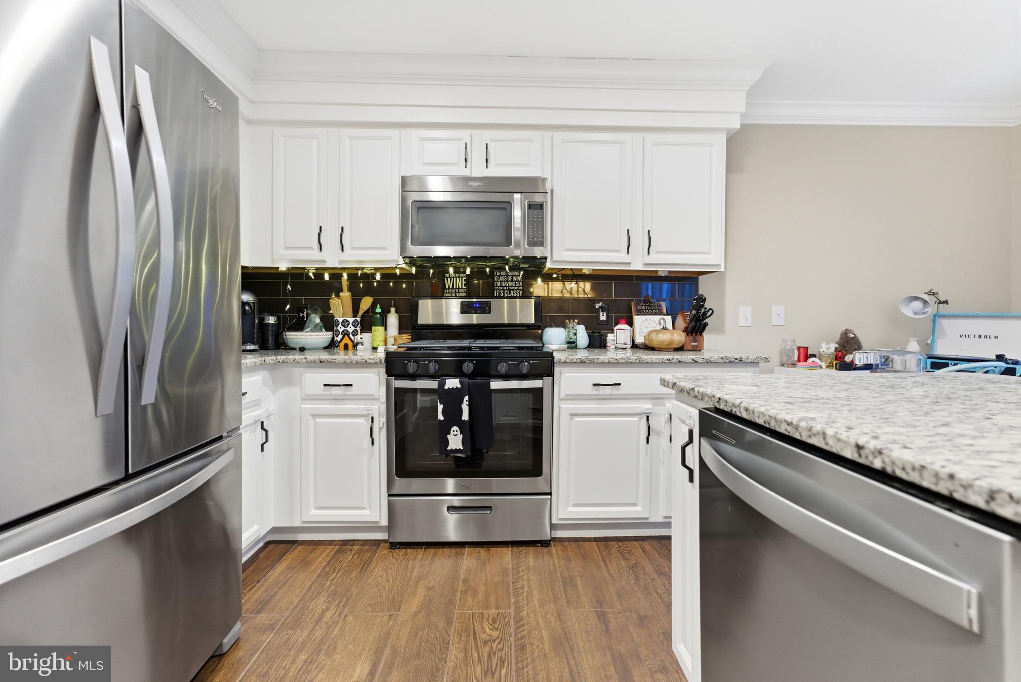 1 Weatherly Road Delran, NJ 08075 - Photo 7 of 32 a kitchen with stainless steel appliances granite countertop a refrigerator stove and sink