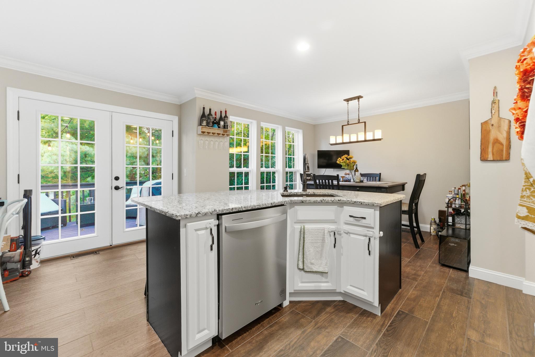 1 Weatherly Road Delran, NJ 08075 - Photo 8 of 32 a kitchen with granite countertop a stove a sink and a refrigerator