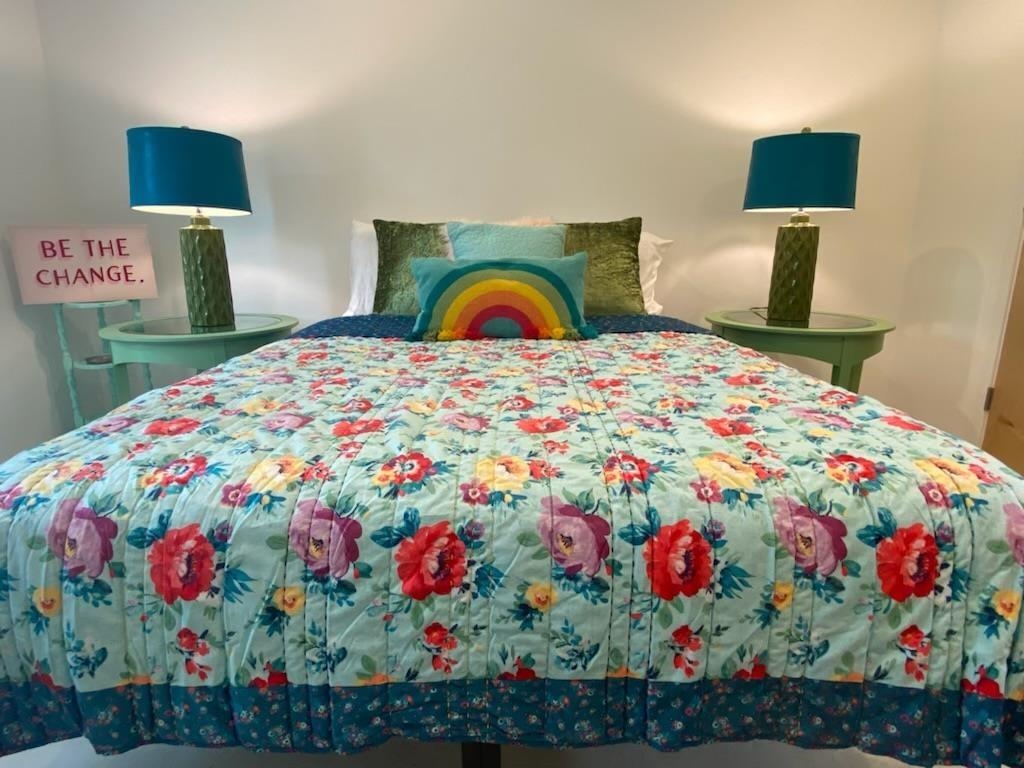 1417 Highland Boulevard St. Augustine, FL 32084 - Photo 7 of 8 a bedroom with a bed and a dresser