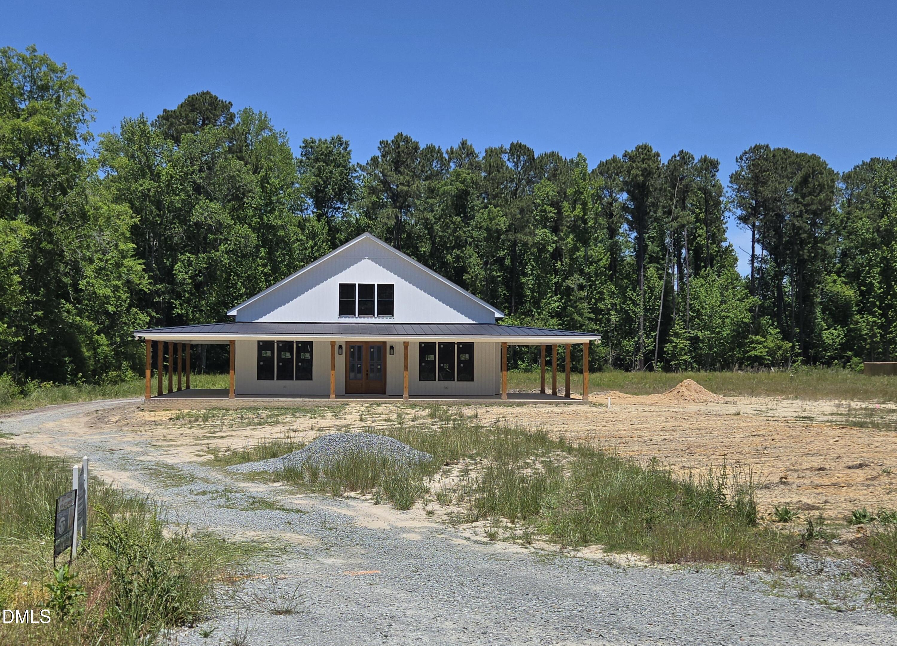 300 Avery Road Erwin, NC 28339 - Photo 38 of 38 a house with trees in the background