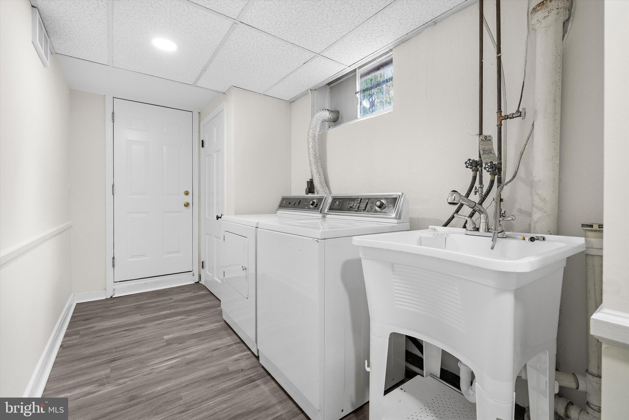2301 Pickwick Road Baltimore, MD 21207 - Photo 31 of 50 a bathroom with a sink and mirror