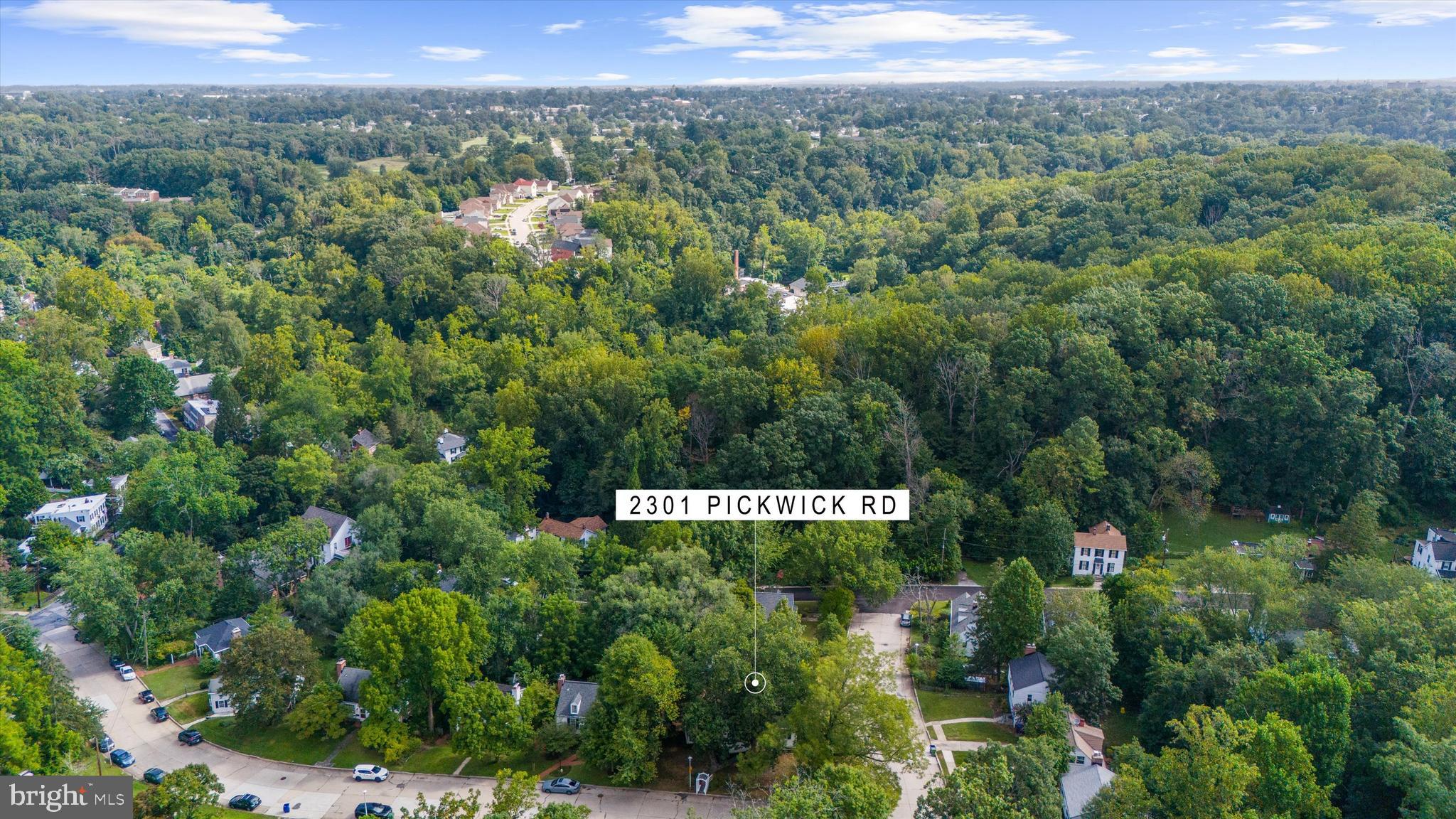 2301 Pickwick Road Baltimore, MD 21207 - Photo 46 of 50 a view of a city and lush green forest