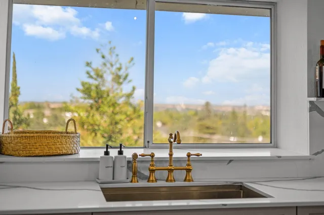 a view of a sink and window