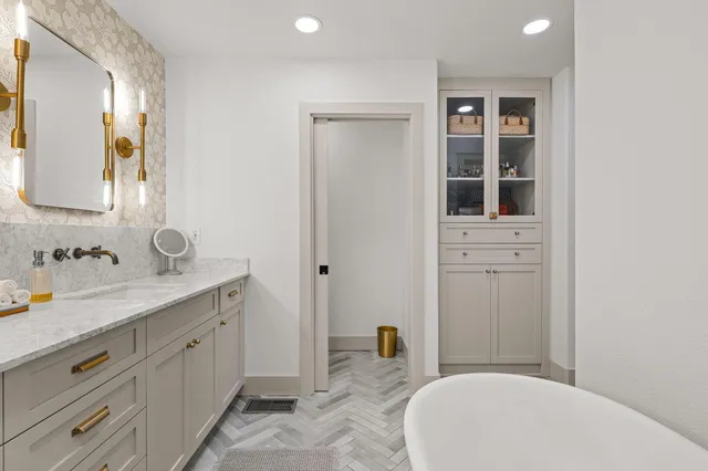 a bath tub sitting in a bathroom