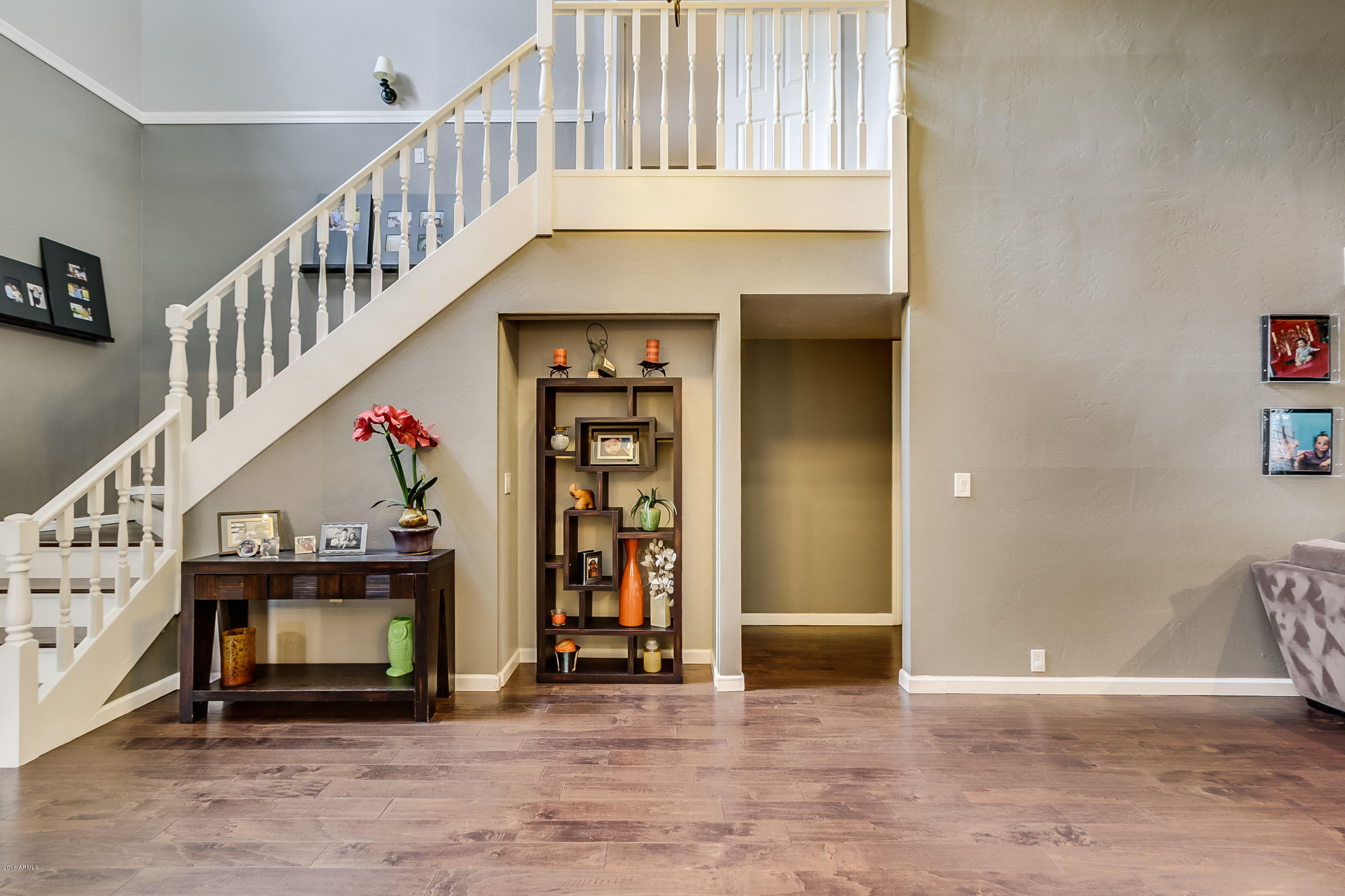 613 West Ocotillo Road Phoenix, AZ 85013 - Photo 2 of 18 a view of an entryway with wooden floor