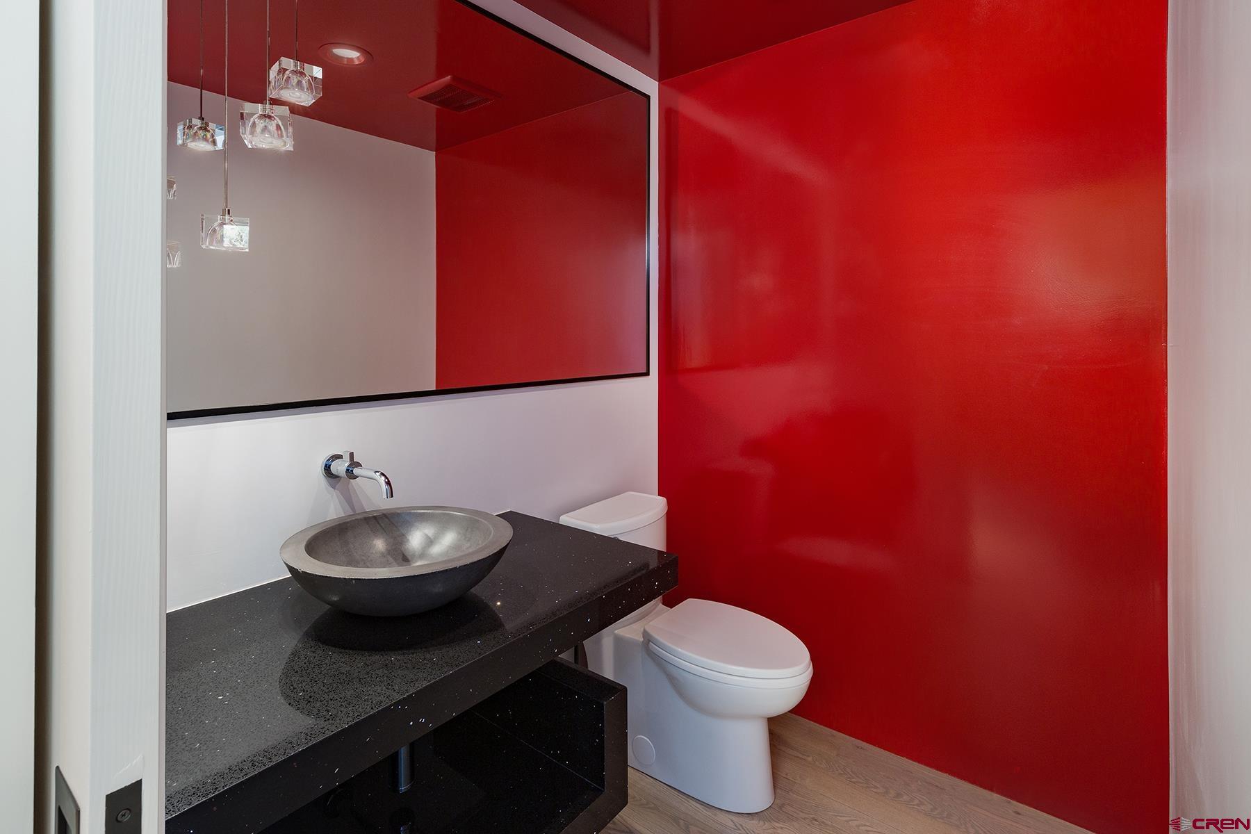12 Falcon Way Durango, CO 81301 - Photo 13 of 35 a bathroom with a toilet and a sink