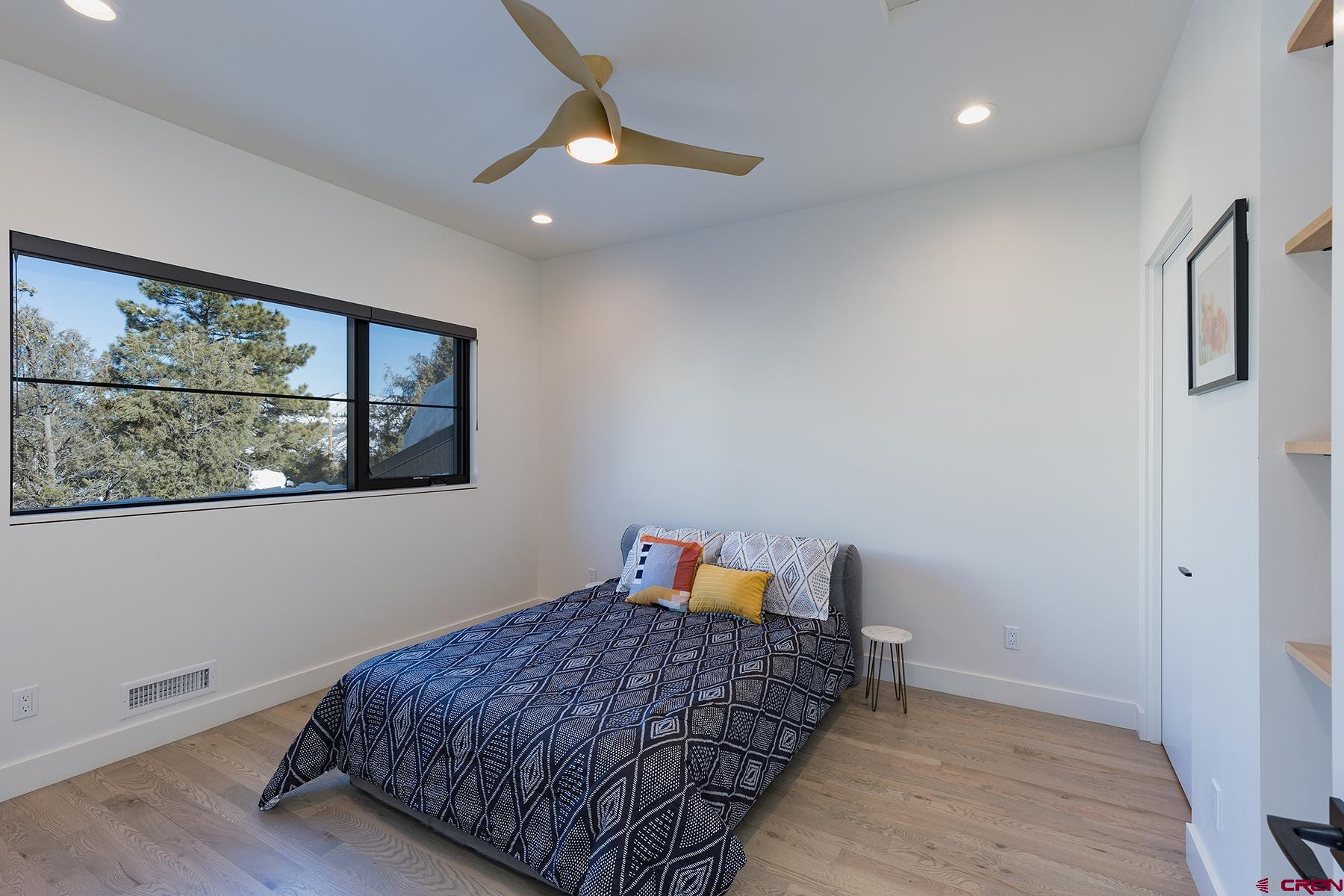 12 Falcon Way Durango, CO 81301 - Photo 24 of 35 a bedroom with a bed and a window