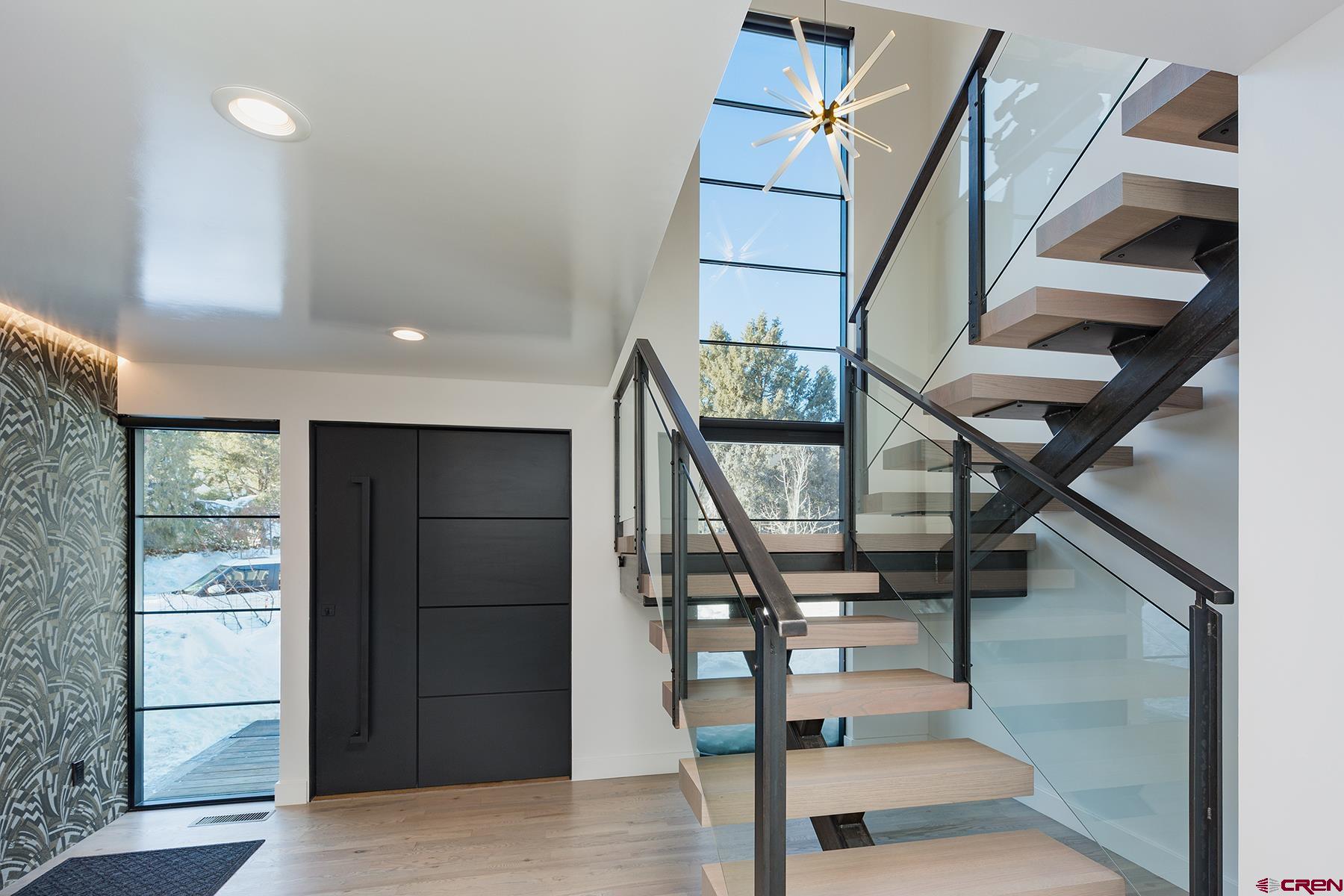 12 Falcon Way Durango, CO 81301 - Photo 3 of 35 a view of entryway and hall with wooden floor