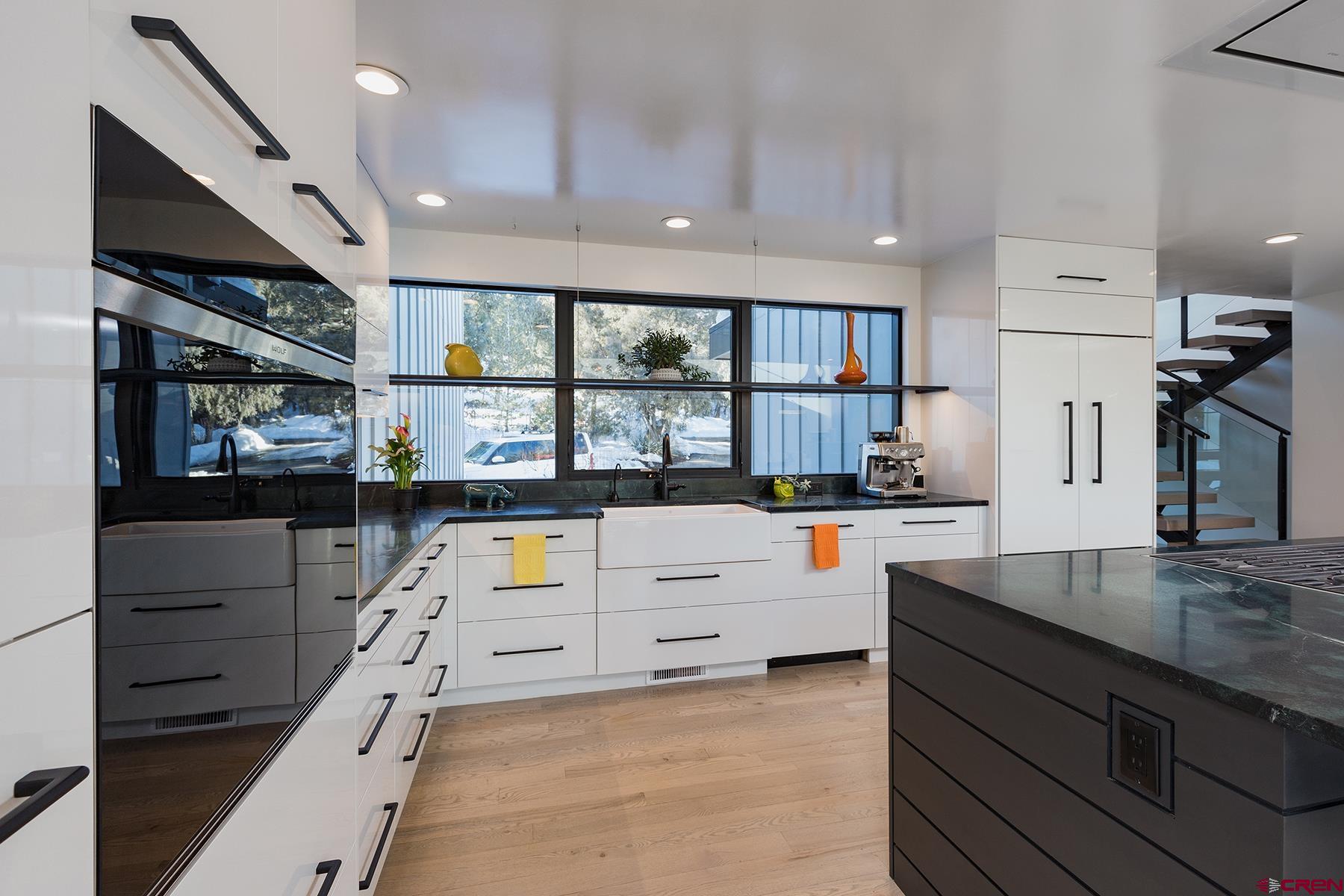 12 Falcon Way Durango, CO 81301 - Photo 6 of 35 a kitchen with stainless steel appliances granite countertop a refrigerator and a stove