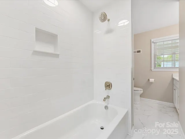a bathroom with a bathtub