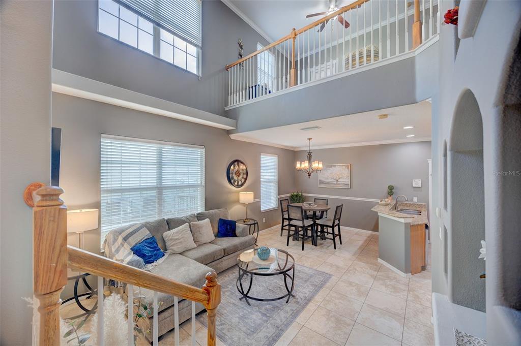 6020 Fishhawk Crossing Boulevard Lithia, FL 33547 - Photo 20 of 53 a living room with furniture and white walls