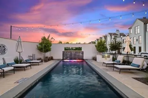 an outdoor space with patio furniture